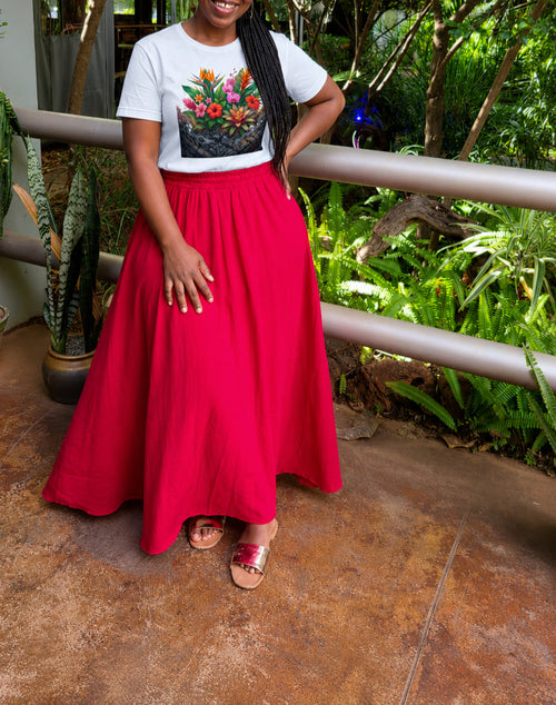 Woman wearing the Beauty for Ashes Tee by Sister Style — Isaiah 61:3 Christian faith African heritage Zimbabwe