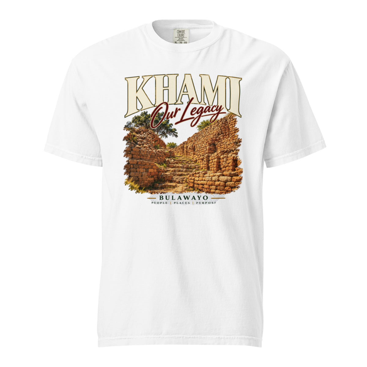 White tee only: Front view of white Khami heavyweight t-shirt with stone ruins artwork, “Our Legacy” and “Bulawayo” lettering.