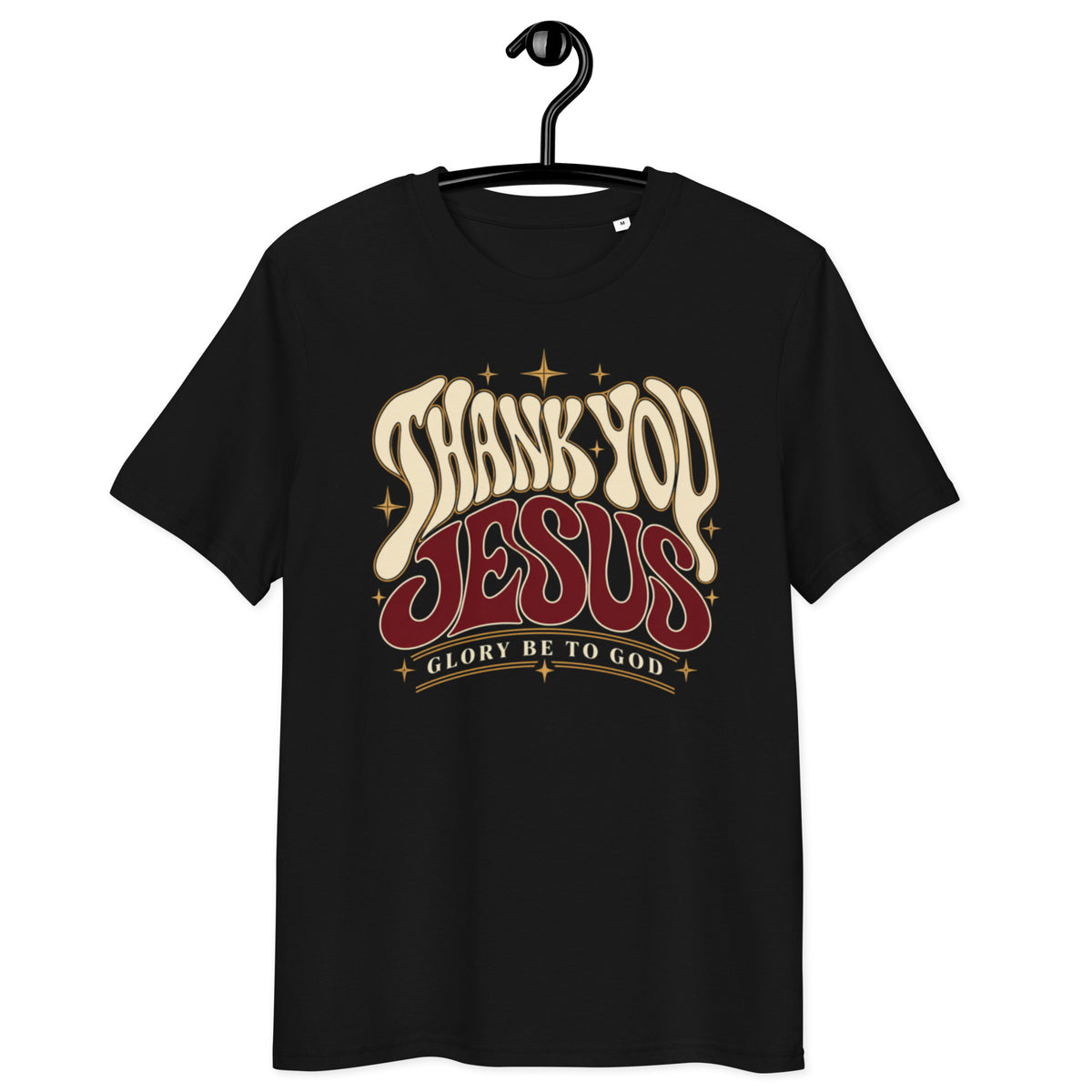 Front view of black Thank You Jesus t-shirt on a hanger, with retro lettering, star accents and “Glory Be to God” beneath.