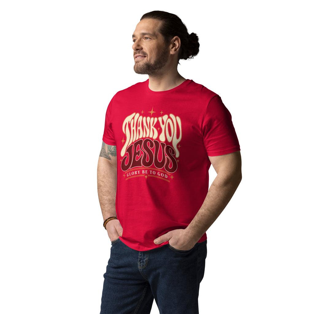 Man wearing a red Thank You Jesus organic cotton t-shirt with cream and deep red lettering, angled front view.