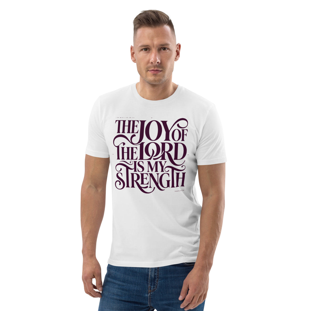 Man wearing a white Sister Style organic cotton t-shirt with “The Joy of the Lord Is My Strength” in dark flowing lettering, front view.